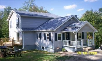 2 Story, 3 BR, 2 Bath, kitchen-dining combo, LR, Laundry Room, Full unfinished basement. House totally redone.  New roof, windows, siding, drywall, kitchen, 2 baths, new plumbing, electrical, hot water tank, new well & pump.
