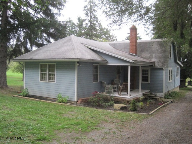 Private setting  but close to everything.  This 3 bedroom Cape Cod has a walkout barn and pasture area.  This cozy Cape has updated bath and good room sizes.  The 2.68 acre lot size makes this a steal at this price.