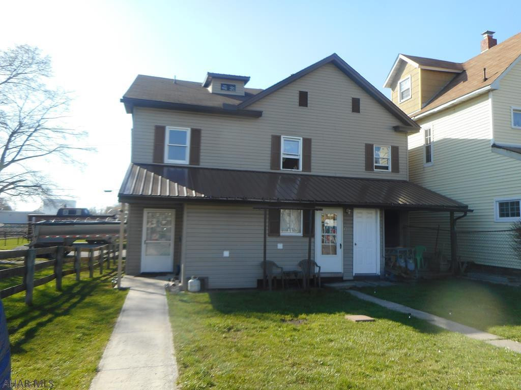 Well maintained three unit apartment building. Vinyl sided with shingle roof. Tenants pay utilities. Two hw boilers. 3-100 amp breaker boxes. Rear parking for 4 and front street parking. Great property for the money.