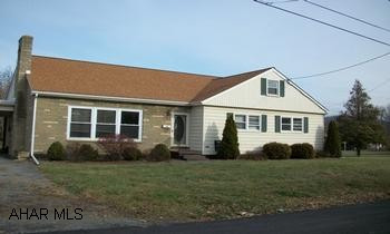 Lots of house for the money - 3 bedrooms, 2 baths, built in 1960.  Large livingroom with gas fireplace, basement is partially finished, eat-in kitchen, nice deck!  Paved drive, carport, shed.  Agents - see instructions for disclaimer.