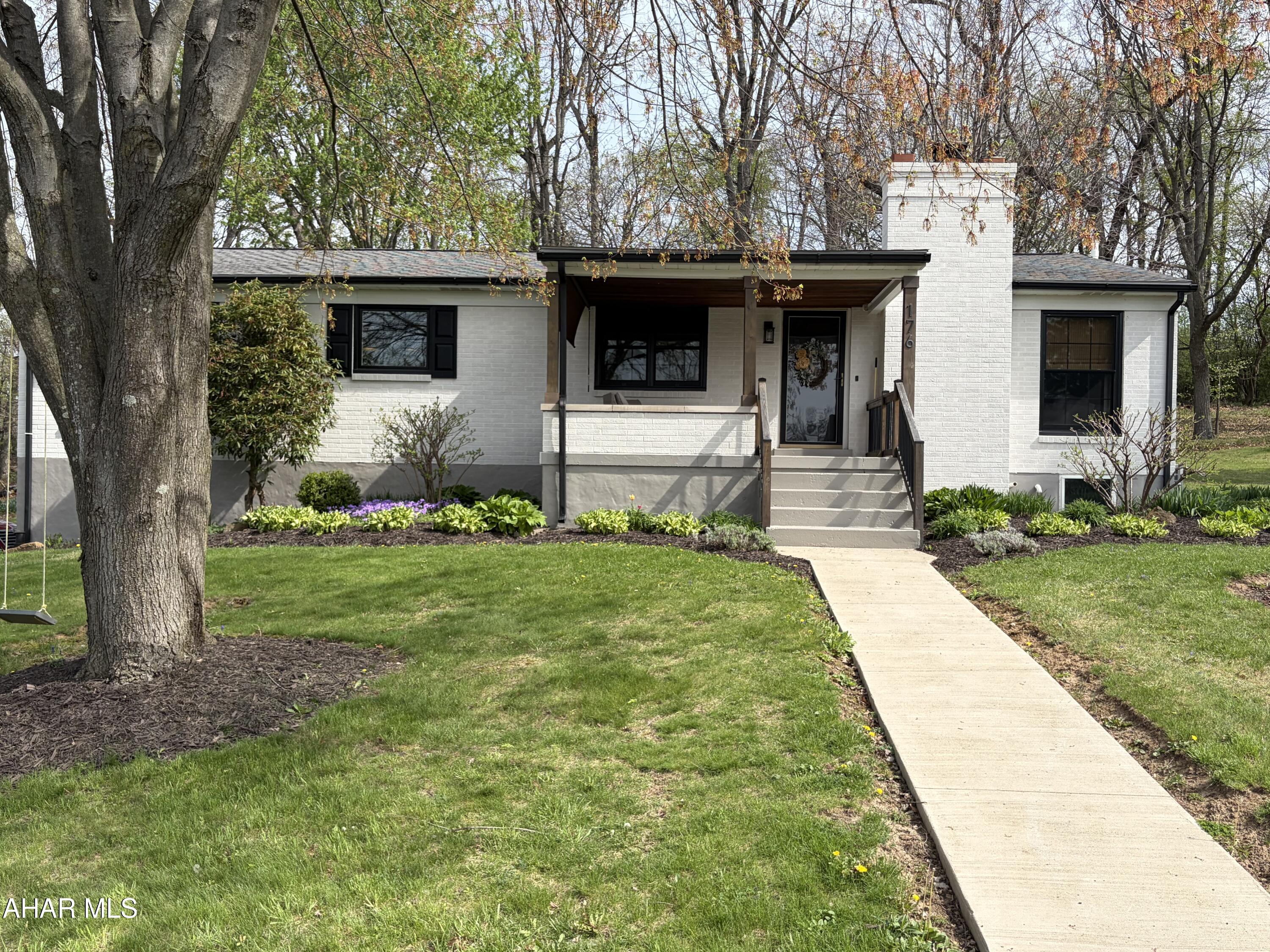 Pack your boxes and bags because this home is ready for you. This 3 bedroom, 2 bath home has been meticulously upgraded with attention to detail throughout.  Nothing for a new buyer to do but move on in.  The new  eat-in kitchen is simply gorgeous with tons of natural light and counter space for the cook in the family.  The hardwood floors throughout are simply stunning.  With the space of a multi-level you won't believe it is a ranch home.  Nestled on a quiet street Hollidaysburg you will feel like you are in the country with the undisturbed woods in your backyard.  There is so much to say about this home  but schedule your showing today and see in person all this home offers.