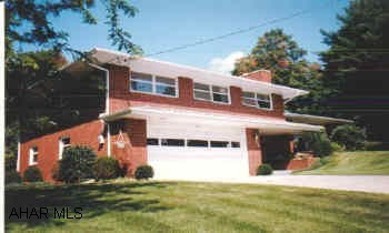 4 BR brick split level on large corner double lot. 2 car integral garage- move-in condition. MLS# 11656 4 BR brick split level on large corner double lot. 2 car integral garage- move-in condition. MLS# 11656