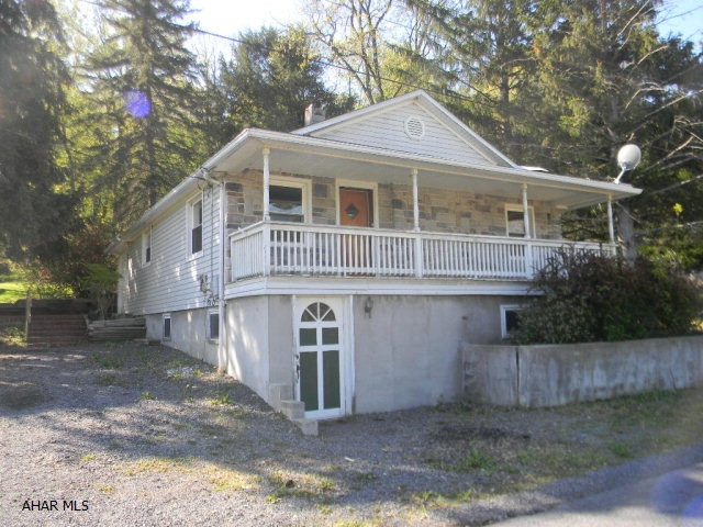 Cozy 1-story 2BR/1BA vinyl clad home on 1+ acre site in Chestnut Ridge Area. Featuring a large sunny family room with fireplace, newer FA furnace and public sewer. Available Immediately! Seller will pay 3.5% Buyers Closing Cost!