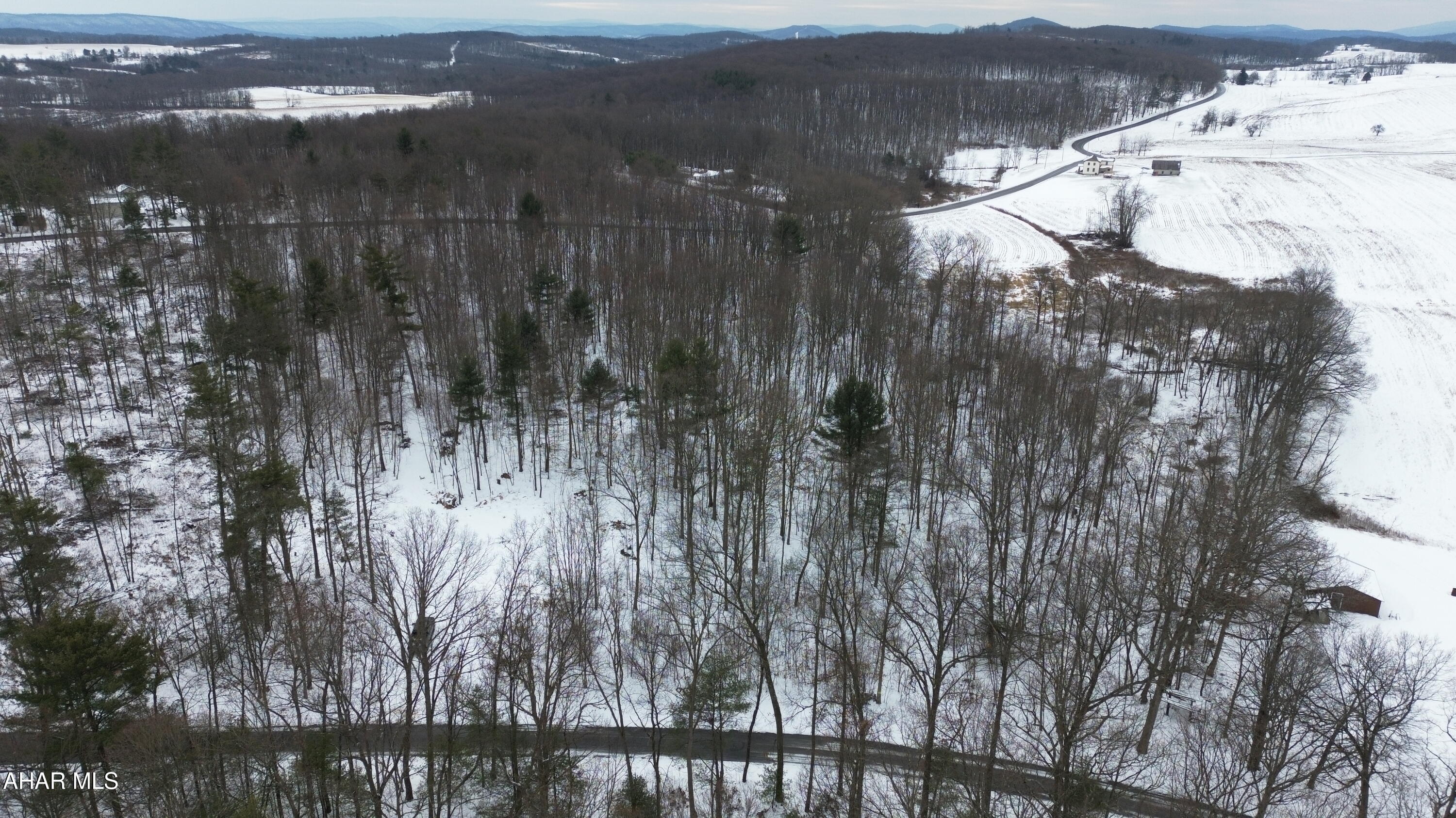 15+/- Acres offering two perc-approved building sites and a well. The property has road frontage on Clear Ridge Rd and Barkman Ridge Rd and would make a great location to build your dream home or getaway.