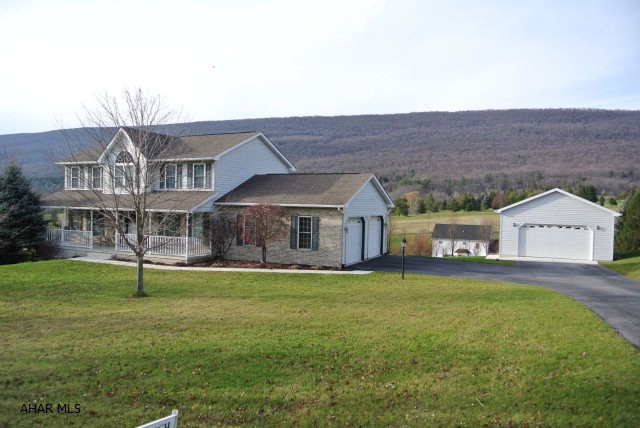 Over 3000 square feet of Living space setting nearly an Acre of ground in Scotch Valley makes this Modern 2 story home an excellent buy for those who like space inside and out!  Along with some Fantastic exterior amenities like.... 2 Garages, a Huge Sun-room leading to an additional Composite Deck, New Professionally landscaped Patio w/pavers around the paved Fire-pit make this even more desirable.  Also, this Magnificent home's interior offers 2 Fireplaces, A Finished walk-out basement, a humongous Master Suite with Cathedral ceilings, Open Kitchen to Family Room, a Heated integral Garage, and Spacious Rooms throughout.Take your family away from the city bustle to a more quiet country setting......Yet...you will actually be only 10 minutes to town to get what you need.!
