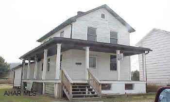 Needs lot of work - Newer roof, soffit, and hot water furnace.  Flood Plain.  30 amp fuse knob & tube.