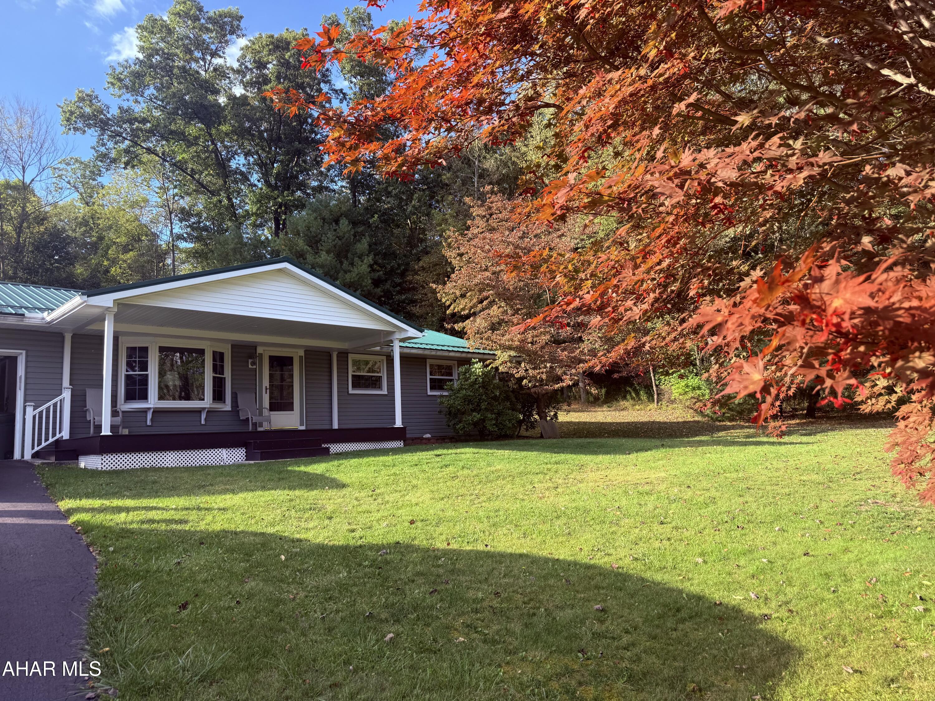Meticulously maintained 3-bedroom, 1-bath ranch home located in the desirable Greenwood section of Altoona, perfectly positioned at the end of a quiet dead-end road for added privacy and minimal traffic. This charming home sits on a spacious .41-acre lot, offering both comfort and room to enjoy the outdoors.

Step inside to find beautiful hardwood floors and a thoughtfully updated interior featuring a newer kitchen and updated bathroom, blending modern convenience with classic charm. The home also offers central air conditioning to keep you comfortable year-round.

Downstairs, you'll discover a large, open, dry basement with endless possibilities--perfect for additional living space, a recreation room, workshop, or storage.

Additional highlights include an oversized one-car garage, durable vinyl siding, and a new metal roof, providing peace of mind and low-maintenance living.

If you're looking for a move-in ready home in a quiet, convenient Altoona location, this well-cared-for property is one you won't want to miss.

Pre-approved buyers only.  Buyer to confirm taxes and square footage.