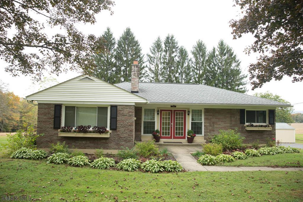 This beautiful ranch home is right outside Ebensburg Borough sitting on an acre lot.  This 3 bedroom 2 bath home has had extensive renovations.  Solid bamboo flooring throughout first floor.  Entertain family and friends in the open kitchen/living room, large island great for food prep, all new appliances included.  Get cozy this winter next to the stunning gas fireplace in living room.  Both baths are updated, new windows, new deck, new furnace, new gutters, new landscaping.  Relax in the evenings on the new deck either watching the sunset or deer eating right from the apple trees.  One car detached garage, shed for storage.  The large basement can be finished for additional family living space. Central air.  Call today!
