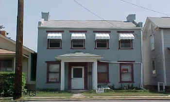 Large living room  with nice fireplace and large eat-in kitchen.  Nice lot and detached garage.Large master bedroom.
