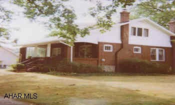 1.5 STORY BRICK AND FRAME WITH 1 CAR DETACHED GARAGE.  CHARMING, CLASSIC, LLYSWEN BRICK & FRAME IN EXCELLENT CONDITION. NEW FURNACE WITH CENTRAL AIR.