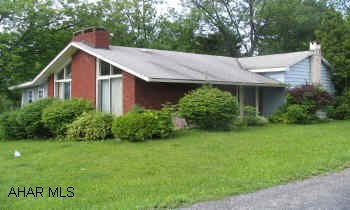 Commercial or Residential!!  Located behind Splish Splash Carwash - direct connections to Convention Center Blvd, Near Walmart, Sam's etc!!  Commercial or Residential!!  Located behind Splish Splash Carwash - direct connections to Convention Center Blvd, Near Walmart, Sam's etc!!  Large master suite with possible nursery or 2nd bath options!!  Cathedral ceilings, large kitchen, sunroom large driveway, fenced yard.  Great investment property!!