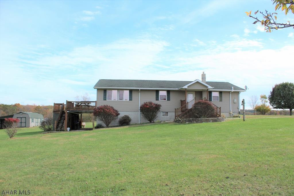 Spacious, freshly painted and newly carpeted 4 bedroom home with lovely views and 3 parcels containing a total of 43+ acres. Gently rolling fields are ready for a small farm, equestrian activities or whatever else you are dreaming of. The house has large rooms, some hardwood floors and an open, airy family room with sliding glass doors that bring the tranquility of the outdoors in. Add your own personal touches and this will become your little piece of heaven.