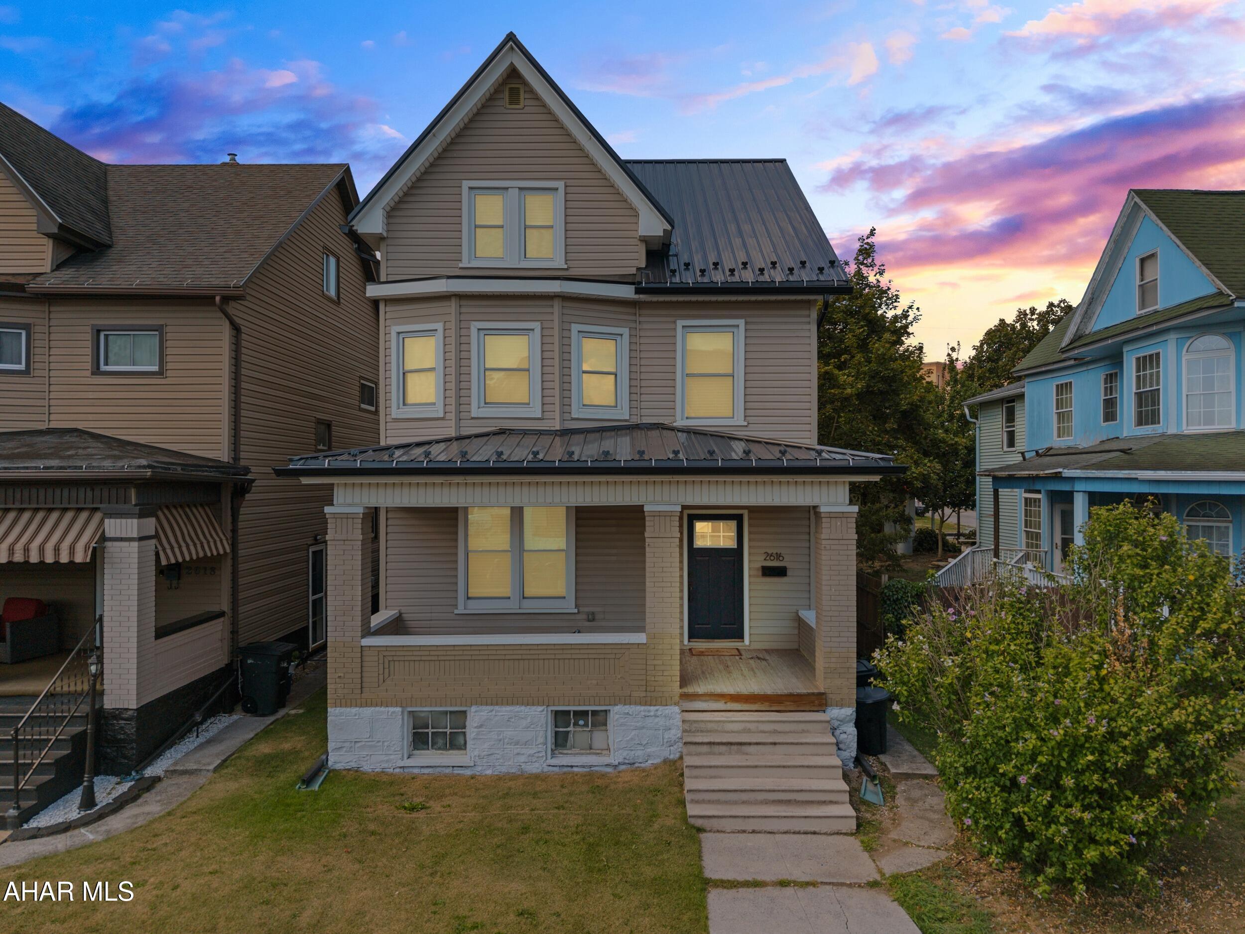 If you love a 2.5 story traditional home but also love a contemporary open concept, this is your dream home. Recently renovated, 3 bedroom, 2 bath home with beautiful white kitchen and island with quartz counters and stainless appliances. Open to the living and dining areas with warm engineered wood floors, recessed lights. This home was a gut renovation so it's like getting a new home. The second floor full bath has double sinks and a tiled tub/shower with glass doors. The 3rd floor is also finished and has its own mini split system, currently a workout space but could be a 4th bedroom, playroom, TV/game room or even a great home office. New furnace, central AC and new water heater and metal roof. There is a fence rear yard and a detached 1 car garage. Bet you can't wait to call this one home!