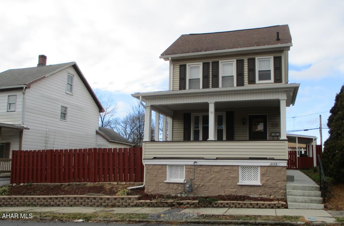 This charming property boasts a lovely two-story home with an eat-in kitchen and a cozy living room. Additionally, it features a fenced yard, an over-sized single-car garage, a workroom, and a shed  The home also offers a walk-up attic and a full unfinished basement for extra space. Beautiful private yard and more.