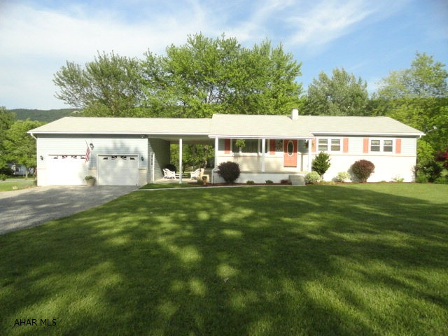 3 BR 1.5 bath, Immaculate Ranch home with Att. 2 Car garage and 15' x 28' concrete floor breezeway. New vinyl siding in 2012. Newer Oak kitchen. Partial finished basement with wall propane gas heater and woodburner. 10 x 14' shed.  Full one acre lot in beautiful West Loop Valley. New tile, vanity and vanity top in basement is inculded in sale. Owners bought for main bath but never installed. Recent water test attached under documents. Only 5 minutes from Hollidaysburg and 15 minutes to Logan Town Centre. Original owners.