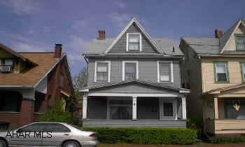 2 1/2 story 2BR home with front porch and rear patio.