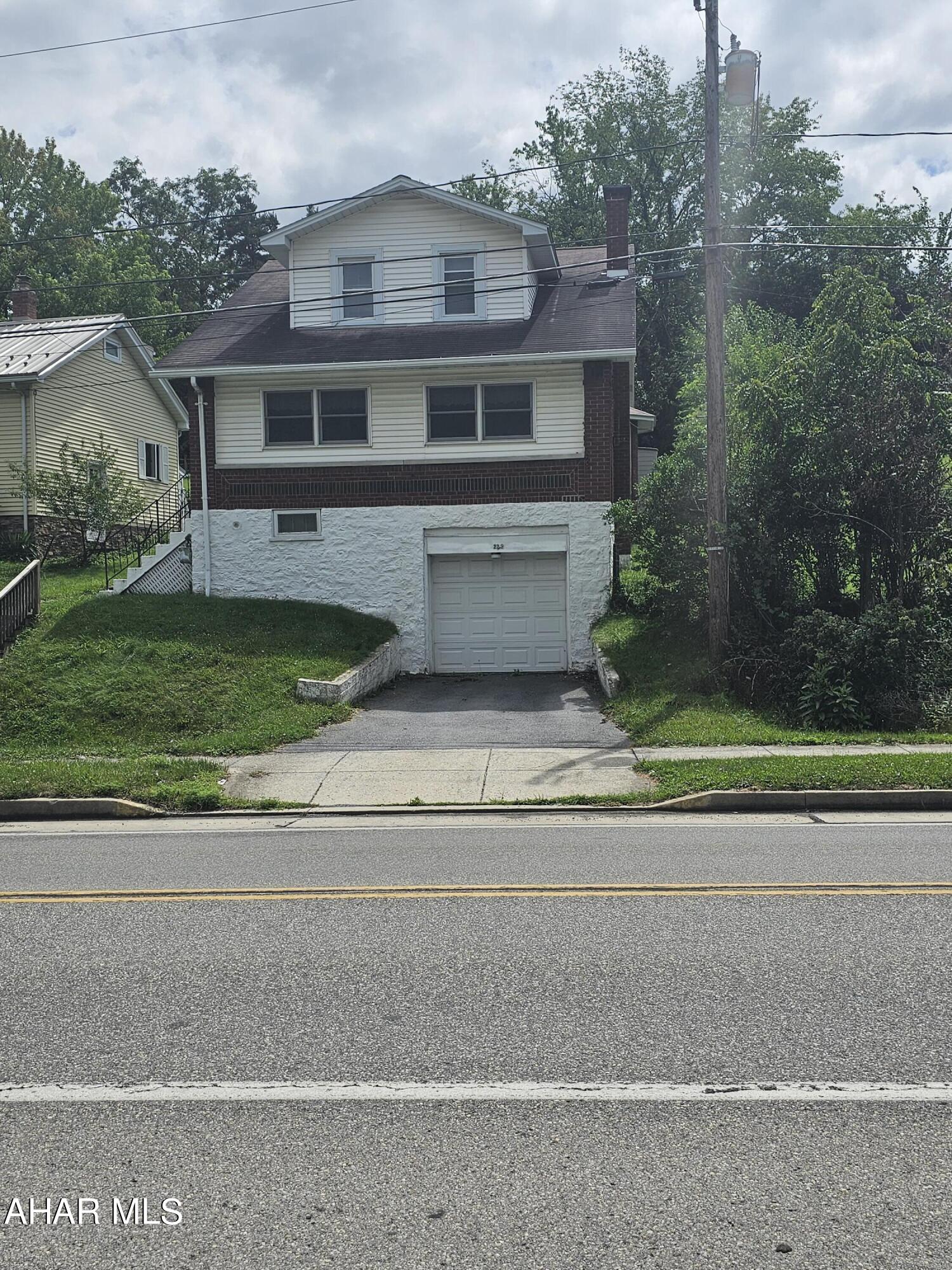 Two story home with a one car integral garage in the Juniata gap area.This home features 3 nice size bedrooms and a full bath on the 2nd story. Enjoy cooking in the eat in kitchen. Large family and dining area. Front and back porch are enclosed. Schedule your tour.