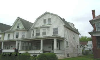 CHARMING HOME WITH LOTS OF CHARACTER. SPACIOUS LIVING AND DINING ROOM. OAK TRIM AND STAINED GLASS WINDOWS. NICE COVERED BACK PATIO AND FRONT PORCH.