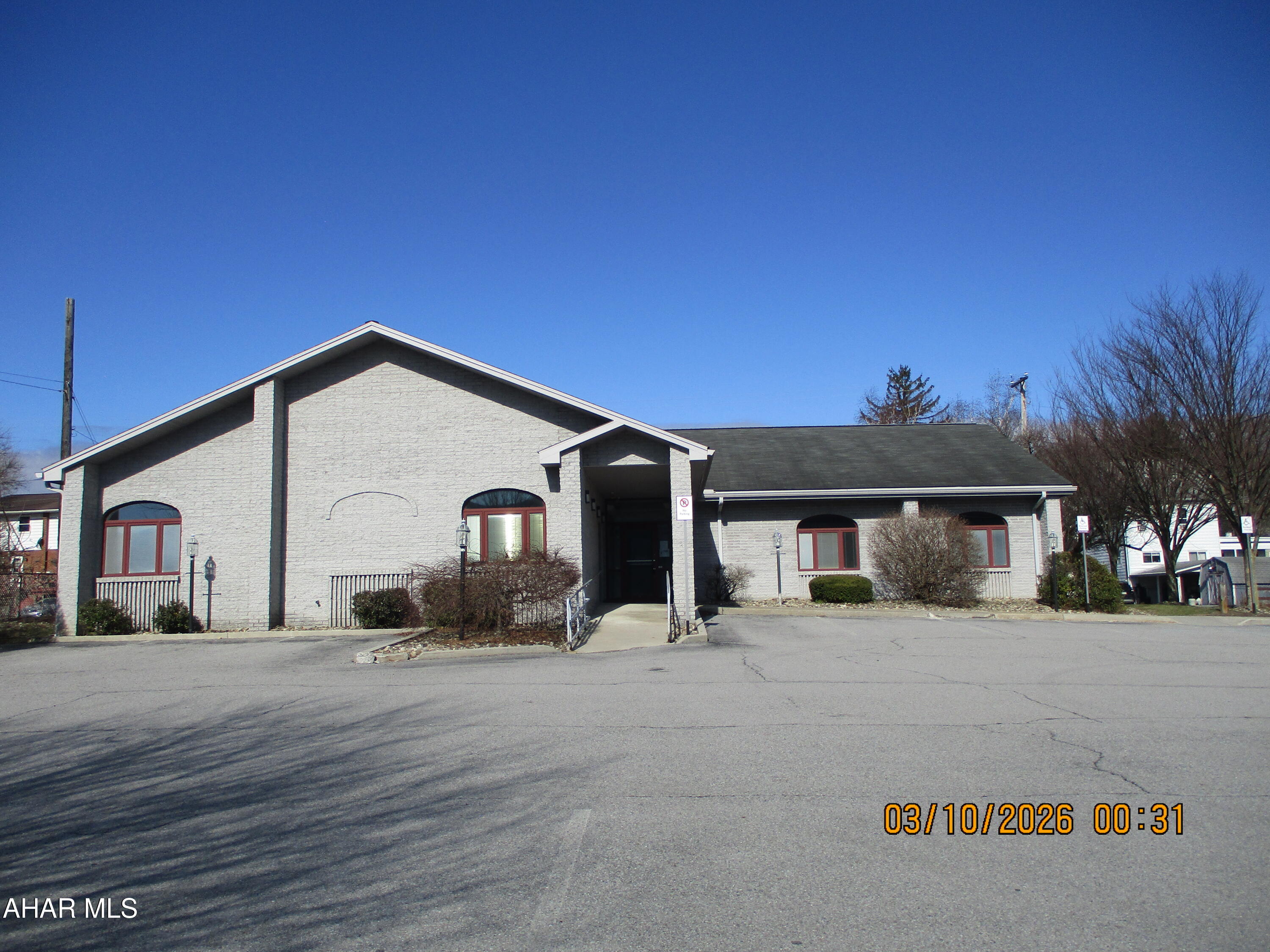 Professional medical building centrally located.  Private offices as well as exam rooms, employee breakroom and large waiting room.  Accessible for handicapped individuals.  Large parking area plus additional parking for employees at rear of the building on unpaved lot known as Logan Avenue, MLS #79314.  Full basement perfect for storage, additional work spaces.