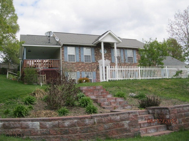 2BR home with totally finished basement. Large garage, storage shed, fruit trees in yard.