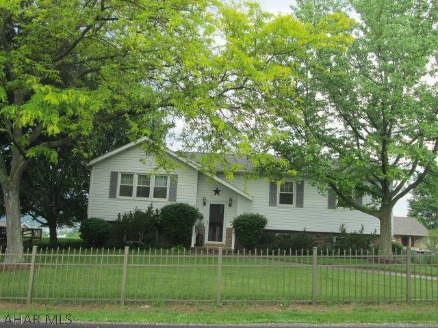 Logan Twp/Greenwood- Original owners of this updated bi-level. The spacious LR flows into the DR which offers beautiful views. KIT includes updated granite tops and all updated appls. The back sunroom is heated and cooled. Master bedroom has a 3/4 bath. Lower level totally finished with office, rec room and 4th BR. Double shed is included.