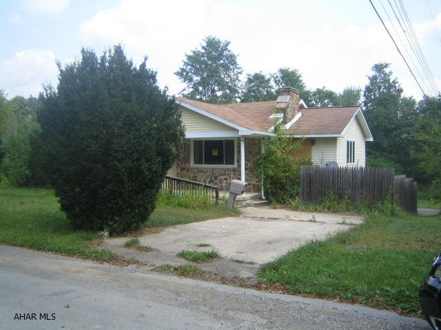 Large 1 story Juniata home in need of major TLC throughout. Loads of potential with large addition that could be converted to multi-family dwelling with some work. Large rear addition with indoor in-ground pool in need of complete overhaul. Property is being SOLD AS-IS.