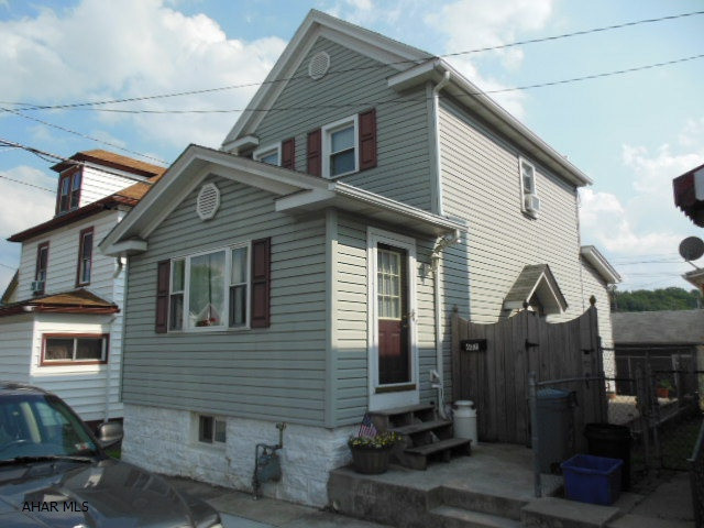 REDUCED!!  Nicely updated, 2 story in Juniata. New carpet, pergo flooring, appliances, window A/C, laundry on 1st floor. Large & beautiful oak kitchen, updated bathroom, private patio in rear and low, low taxes! YOU MUST SEE INSIDE! Very easy to maintain! Newer furnace, electric panel, pex water lines and service (copper from the street), insulated windows even in basement. Handy to Altoona Campus of Penn State, local shopping, hospital & pharmacies, food vendors, mechanics, etc..  Heat avg $74/mo.  *Way better than renting!!  Don't wait!