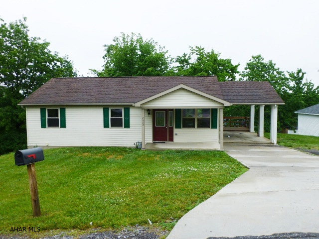 Newer construction featuring vaulted ceilings, large living room with gas fireplace and french doors to large deck.  3 bedrooms & the master bedroom has step in shower.  Large open basement ready to be finished!  Handicap accessible main floor.