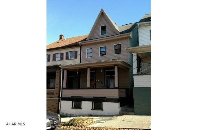 3-4 bedroom home with updated bath & kitchen. Formal dining room, finished 3rd floor. Partially fenced yard. Nice opportunity!