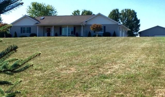 This much sought after meticulously maintained brick ranch located on 2 scenic acres is a rare gem. No detail was overlooked in this fabulous renovation. This is truly one story living at its best. From the moment you enter this home, it is obvious that the homeowner has spared no expense in making this home unique. Quartz countertops, stainless steel appliances, new flooring, custom design elements and the main floor laundry room make this home wonderful. Two beautifully renovated bathrooms add to the appeal. A 2 car garage adds convenience while the huge 32' X 40' garage makes an ideal workshop. The breathtaking views that surround the home make this an amazing value. Within 5 to 10 minutes of historic Bedford.