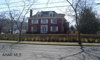 2-story red brick home on large corner lot in Bedford Borough with a 2-car detached garage. Currently operates as the Pioneer Historical Society of Bedford County.  Desirable location, close to schools,and walking distance to downtown.  Special features include alcove with bow windows, a Butlers pantry, spacious rooms,  high ceilings, a 2nd floor service entry to kitchen, and 4 wood burning, solid oak trimmed fireplaces.  This property has endless possibilities.  A must see!For more information or to schedule a showing, call Cindy Caddy at 814 977-3023 or Vickie Geisler at 814 285-2241.