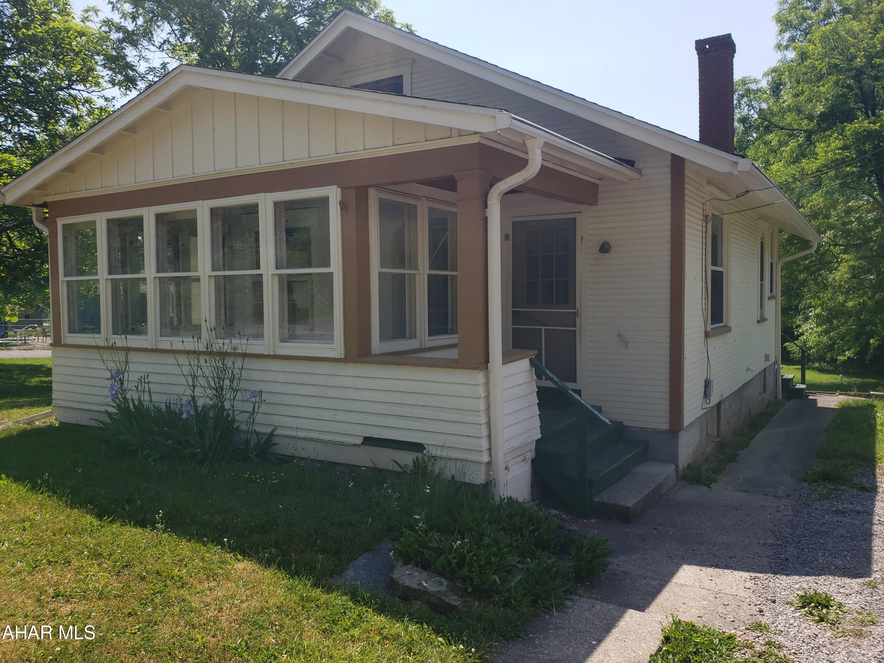 Ranch home in Hollidaysburg School District, 2 or 3 bedrooms, sun porch, on .59 acres. Newer roof, furnace and insulation. Mature trees, large yard, and convenient location waiting for a new owner.