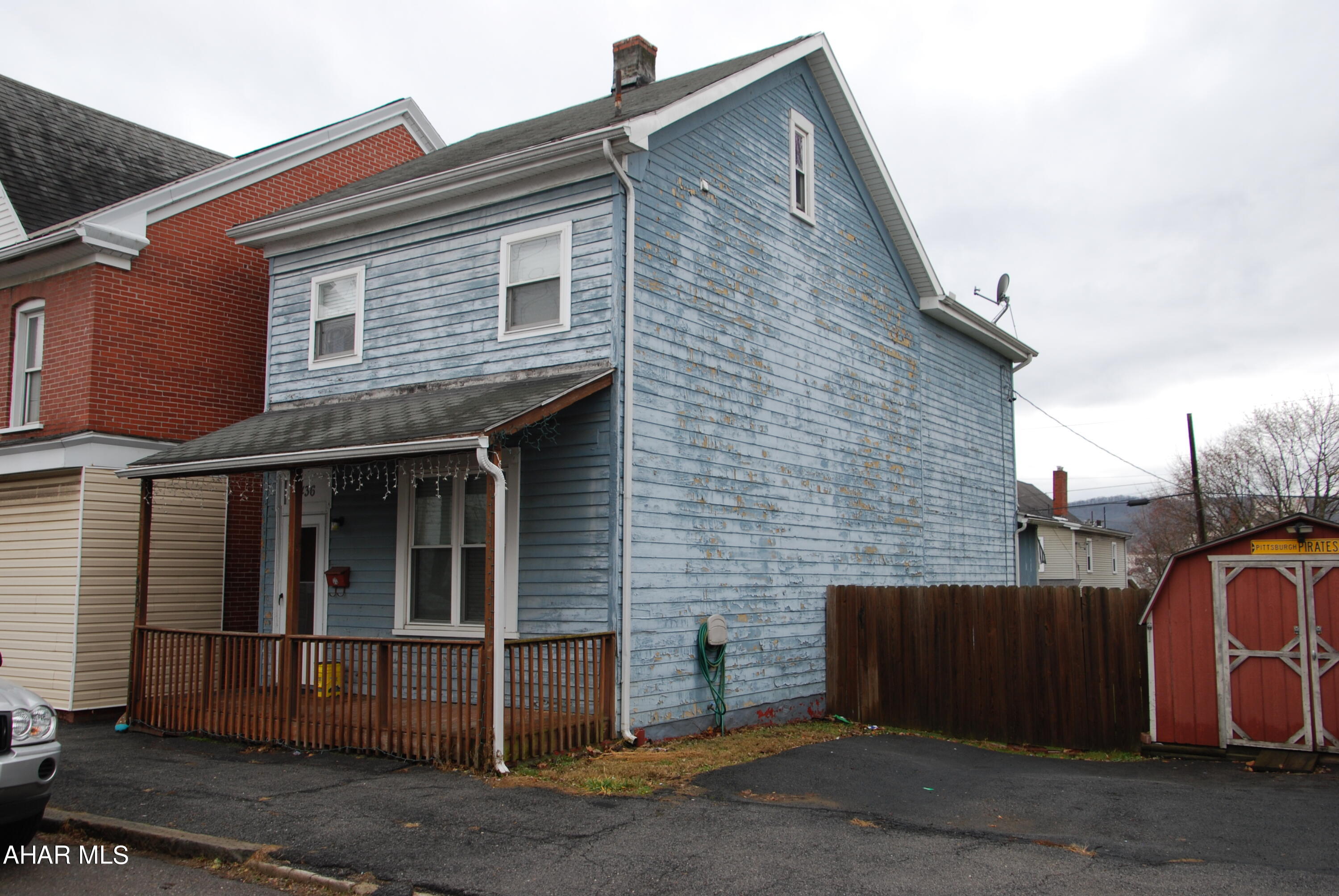 With some TLC you can make this home into what you are looking for. It offers a fenced in yard and paved off street parking.