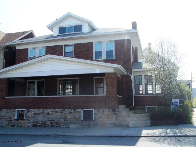 Hardwood floors and solid oak trim throughout, larger rooms, corner lot, 2 car garage, loads of storage, newer kitchen with new ceramic floors, private patio, built-in pantry.