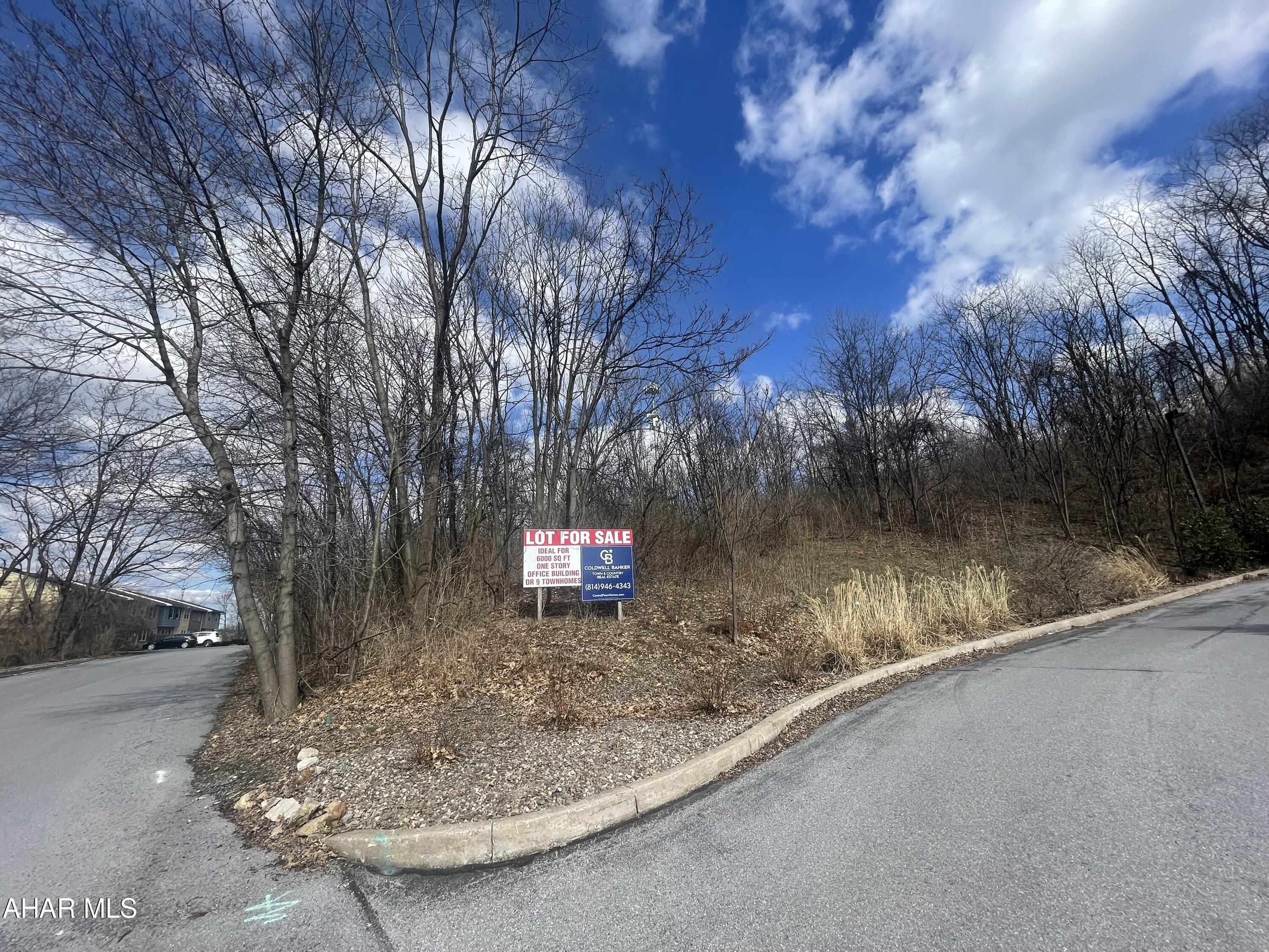 Great light industrial-commercial location! 0.7 acre. Plans available to build office building.