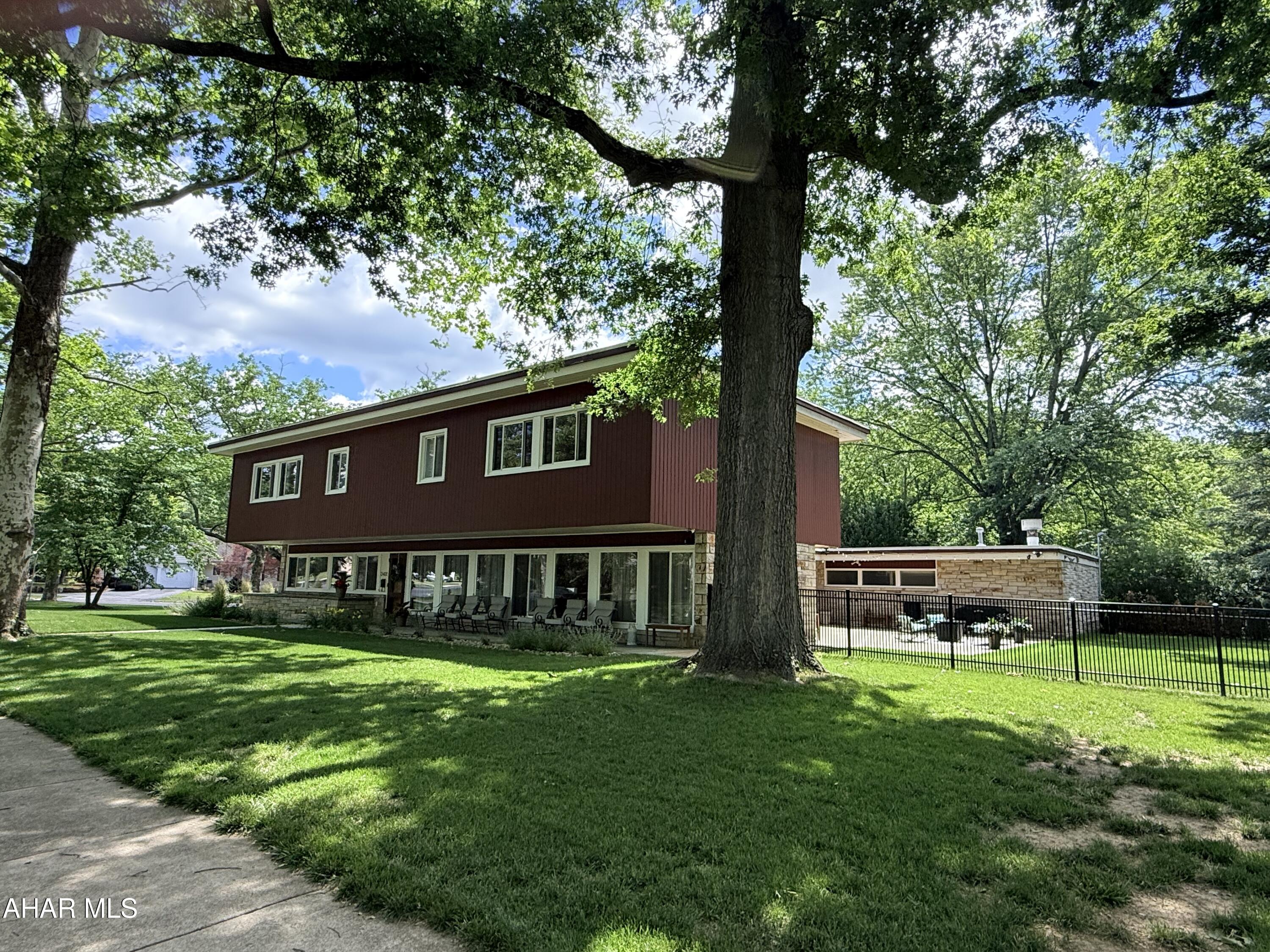 ---



**📍 3405 Baker Boulevard, Altoona, PA 16602**
✨ **6 Beds | 3.5 Baths | 4,013 Sq. Ft. | 0.52-Acre Lot**

Step into mid-century modern elegance in the historic **Mansion Park** neighborhood! Built with premium custom steel and concrete construction, this architecturally unique 1955 estate blends classic luxury with incredible entertaining spaces.

**Highlights You'll Love:**

* ✨ Grand sunken living room with Linear Fireplace & formal dining room with original build-ins.
* 🍸 Cozy den featuring a built-in wet bar and gas fireplace.
* 🛏️ 6 sprawling bedrooms with massive closet space. Owners bathroom has heated floor. 3 full baths on 2nd floor, all have been updated.
Heating and A/C has been completely updated with a VRF system. NEW WINDOWS THOUGH-OUT the house. 
Too many improvements too list here. 

* 🌳 Beautifully manicured half-acre level lot with new patio and sidewalk. New fence is perfect for pets and kids.

* 🚗 Oversized 2-car attached garage has new Reznor heater. 

New cabinets in Laundry Rm, Coffee Bar, and bathrooms. TWO staircases.



Don't miss your chance to own a true architectural masterpiece in Blair County!

---

**📞 Ready to see it in person? Schedule your private tour today!**


---