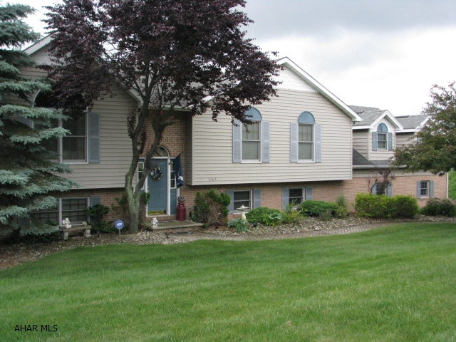 Need space? This is the home for you. Spacious inside as well as having beautifully manicured grounds and an in ground pool with pool house.  Kitchen has been remodeled with beautiful granite counter tops and stainless steel appliances. French doors lead out from several areas in the home to covered decks so you can enjoy both the pool and the view. The three car garage is over-sized and has additional storage.Home sits on three lots and there are three more that could be purchased separately.