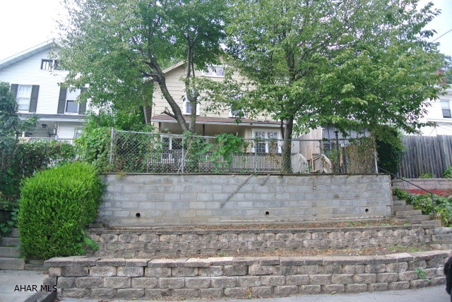 This nicely updated, 3 bedroom home near Mansion Park is priced to sell. Its Newer Oak style kitchen, hardwood floors, rear deck, fenced yard, great mechanics, partially finished basement, and off street parking make this home a great value for a starter family.  It has a nice size kitchen with a breakfast nook, a huge dining and living room, 2 decent size bedrooms, and a humungous master bedroom.  Just take a look, the owner may be willing to alter or work within your needs.