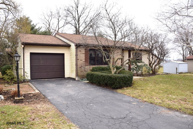 Adorable ranch home in move-in condition.  All new carpeting, ceramic tile in kitchen and baths, central air.  Large bedrooms with good closet space.  Three season sunroom, brick patio.  Unfinished basement, easily finished.  One car attached garage. Pretty back yard.   Convenient location.