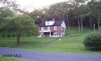 A hunter's paradise with the original brick homestead.  Wildlife galore with bear, deer, turkey, and squirrels.  The property adjoins the Raystown Branch of the Juniata River which offers plenty of fishing and boating.