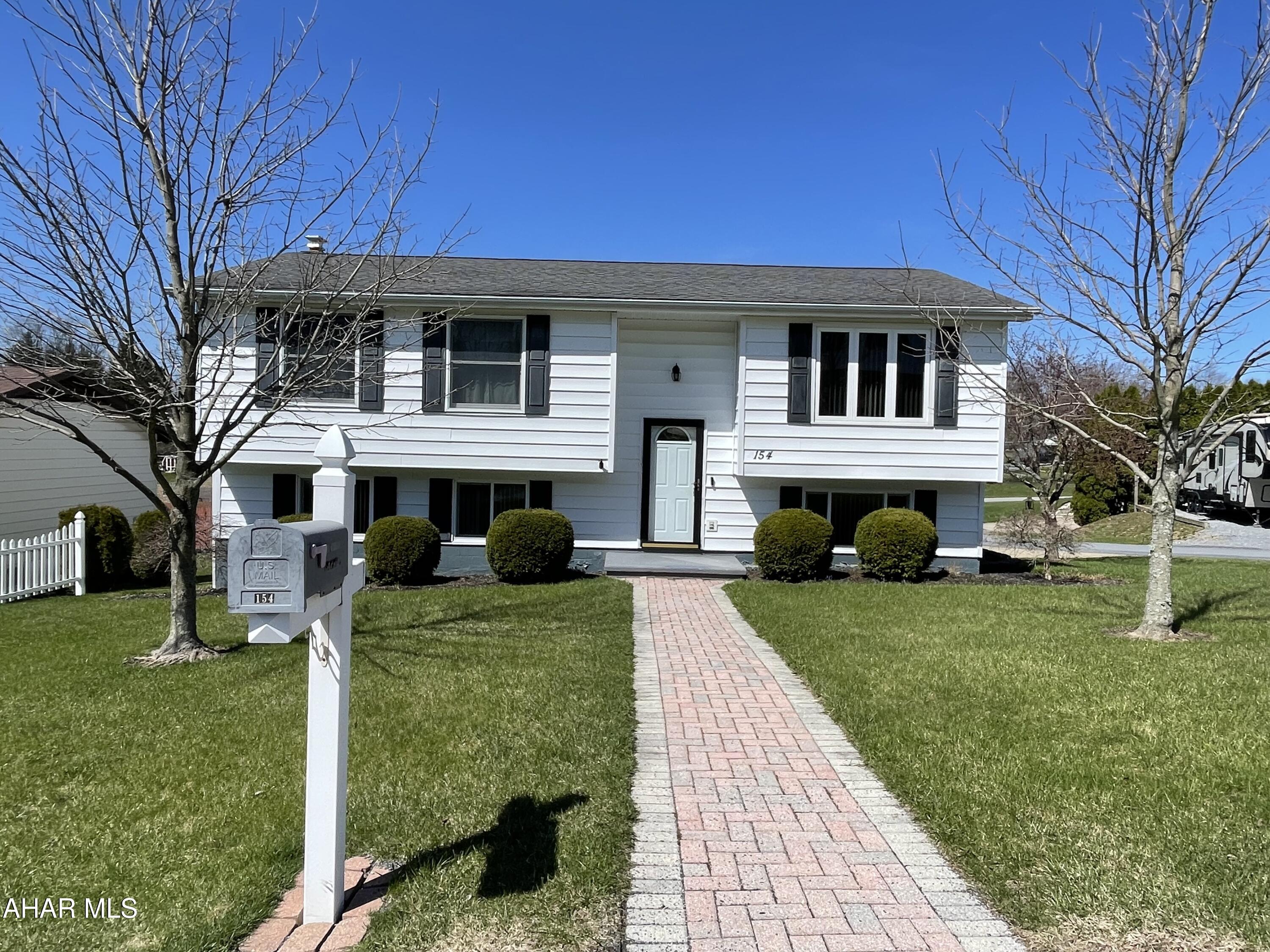 If you have been looking for a large home in the Cambria Heights School District then look no further than this 4 bedroom 2 bath home in the heart of Carrolltown!  Built with entertaining in mind this home has plenty of living space for your family and friends to spread out!  All the mechanics of the home are well maintained.  Kitchen has plenty of cabinet space and it is connected to the dining room for family meals. There is a deck off of the dining room making it the perfect spot for your grill this summer.  The living room is spacious and can accommodate large furniture pieces.  On the main level you will find an updated bath and three large bedrooms all with great closet space.  The lower level also has an updated bathroom a large family room with walk in closet for storage, an oversized bedroom with double closets and a utility/laundry room perfect for storing all your bulk items.  There is plenty of space outside to relax out back and don't forget the large two car garage!  Call today to schedule a showing.
