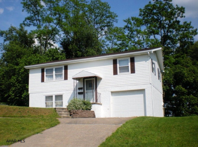 Pride of ownership shows in this clean and well maintained 3 Bedroom, 1.5 Bathroom Bi-Level located in desirable Eldorado (just above Ruskin Drive). New Carpet in all rooms (installed March 2016), New Stove/Oven, Roof Replaced 2000.Thermostats in each room to control the baseboard electric heat, pull down stairs to storage area which is totally floored. Storage space under the staircase and off of the Family Room (lower level). Garage measures 22'x 11'