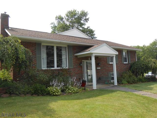 Well maintained brick/vinyl 3 bdrm,3 bathrm. home on .85 corner acre (2 lots) is waiting for your personal touch~The house is separately zoned throughout for your comport needs offering a pellet/fireplace in the lower level family room.The home is wired for a generator that comes along with the house.Ceilings offer radiant heat throughout.Natural gas is available at the curb.All bedrms. offer ph. and cable.The outside space under a covered roof will make you smile when your guests arrive...also offering a barn with a loft,shed potting and a 2 car garage with extra storage and a 3/4 bathrm. located in lower level. Great Room is a newer addition that's great for entertaining as well.Watch for public open house details or call for a showing today!! Community pool and walking trails.