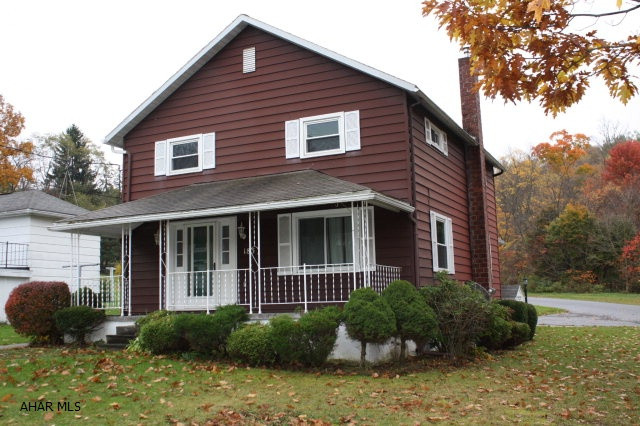 This home is move in ready.  Big rooms with lots of space, covered front and back porch's with small patio off back porch.  Has paved parking space for private parking and an 8x8 outside Shed for tools and mower. Roof was installed in 2006, new furnace in 2008, new windows in 2010 and a Flu liner in 2013. Request a showing today