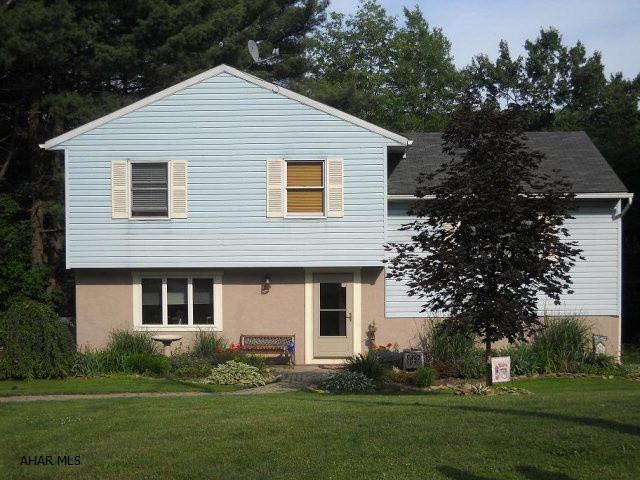 Unbelievably done!  Multi-level home on double lot. Fish off the back pier or just enjoy the scenery. This one wont last long Call today for a showing!