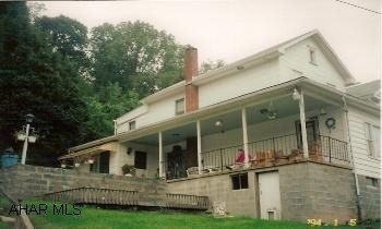 2-Story home on 1.09 acres, 3BR/1BA, newly painted, large living room, new carpeting. Quiet Street.