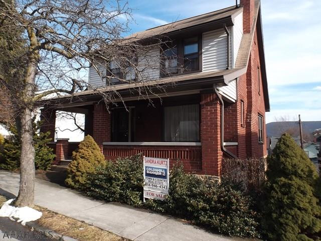 Check out this wonderfully updated Fairview brick home!  Spacious rooms throughout and large bedroom closets.   Newer thermopane windows throughout with glass block windows in basement.  Buderas hot water furnace.  Open front and rear porches.  Property lines are irregular with access to alley and parking.  Tax map shows 50 frontage, with a depth of 75 on left side and 120 on right side.  Fenced.  Walk out basement.   Buyer to verify measurements, taxes and HW flooring.