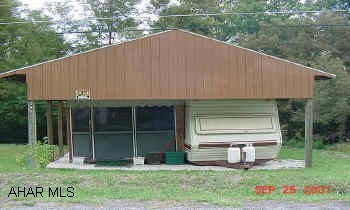 32 Citation Camper with full pavillion on  level lot in Glendale Yearound with screened room, Air, many extras all in mint condition. Camper is like new  with screened room under full pavillion, Air and many extras on nice level lot.  Motivated seller