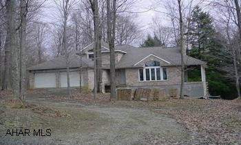 What an opportunity!  Finish this one to your specs.  Building supplies are included with sale.  No heating system.  See agent for sales addendums. What an opportunity!  Finish this one yourself - building supplies are included with sale.  Great lot and location.  See agent for sales addendums.  HOA fees are $367.05 per year.  Quarterly fee for water is $56.31 and $76.32 for sewer