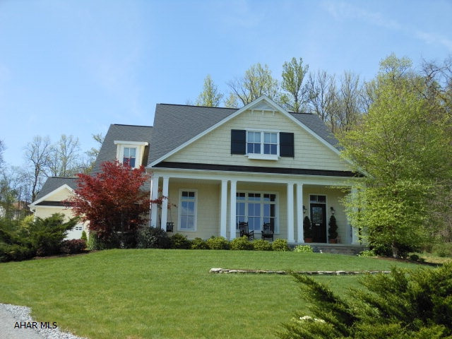 Equisite just begins to describe this custom built home with the best views in town!10 ft.ceilings on the first floor, crown molding,Brazilian cherry floors, built-ins and closets galore. Stunning eat-in kitchen w/ hones granite counterops, DBL ovens, Jenn Aire Range, copper sink, Butlers pantry..opening to family room. Lovely first floor bedroom w/private bath.Stunning dining room w/ wainscoating and gorgeous views. Master suite is warm and relaxing w/ large custom bath. One of 3 other bedrooms has it own private bath. All bedrooms in this home are large and comfortable w/ lots of closets. Finished lower level w/2 rec rooms and tons of storage. Lots of room to entertain on the back custom patio and yard w/ basketball court and large level playing area. Wonderful 2over 2 oversized window